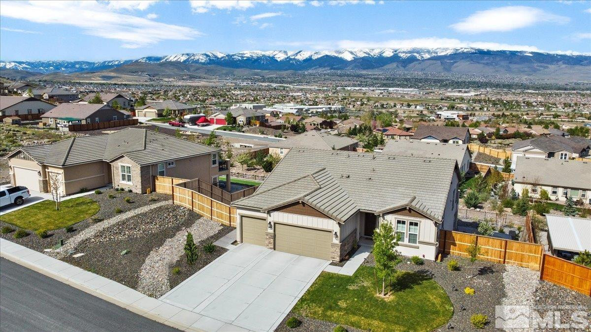 10385 Alchemy Court Reno, NV 89521 - Photo 2 of 40 an aerial view of residential houses with outdoor space