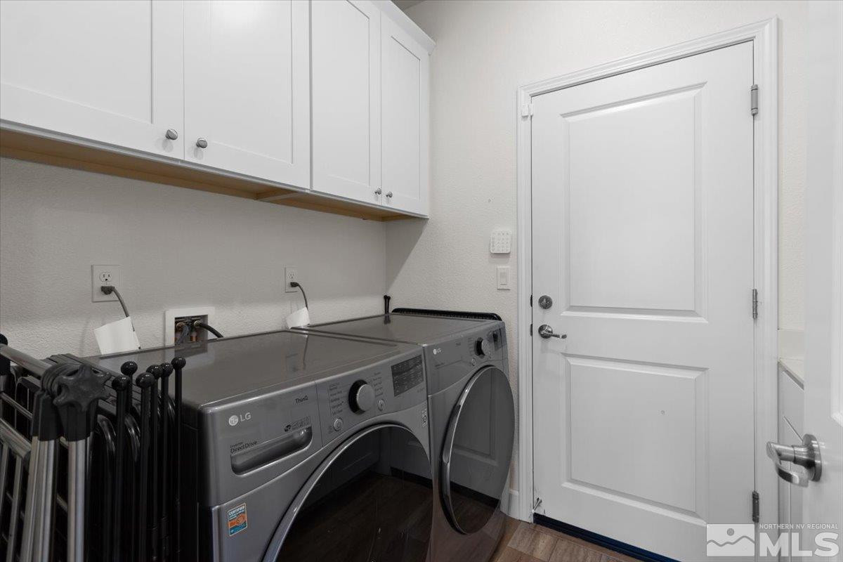10385 Alchemy Court Reno, NV 89521 - Photo 36 of 40 a utility room with dryer and washer