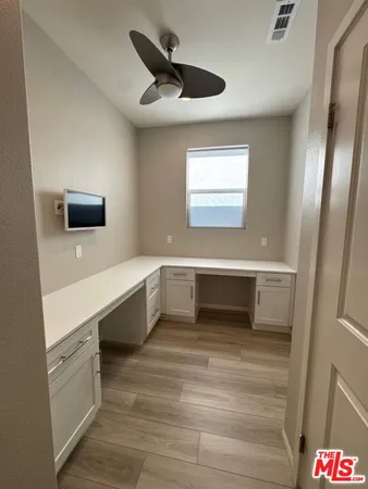 a bathroom with a bathtub and a sink