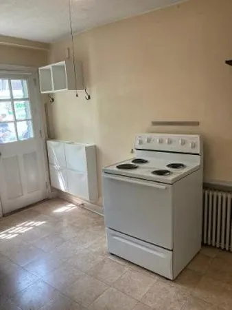 a utility room with washer and dryer