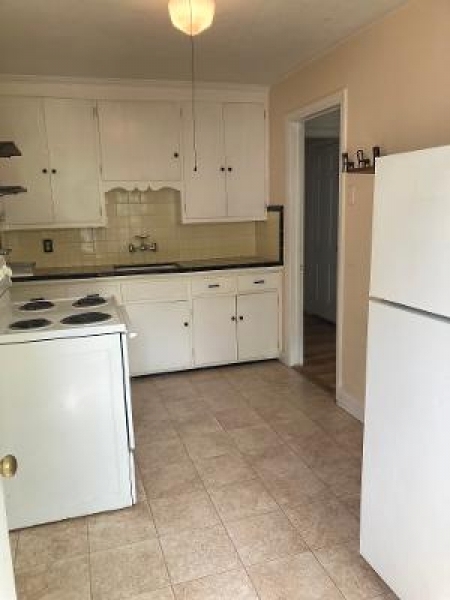 679 Mountain Boulevard, Unit 6 Watchung, NJ 07069 - Photo 7 of 13 a kitchen with cabinets and white appliances