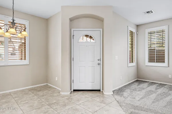 a view of an entryway with a livingroom