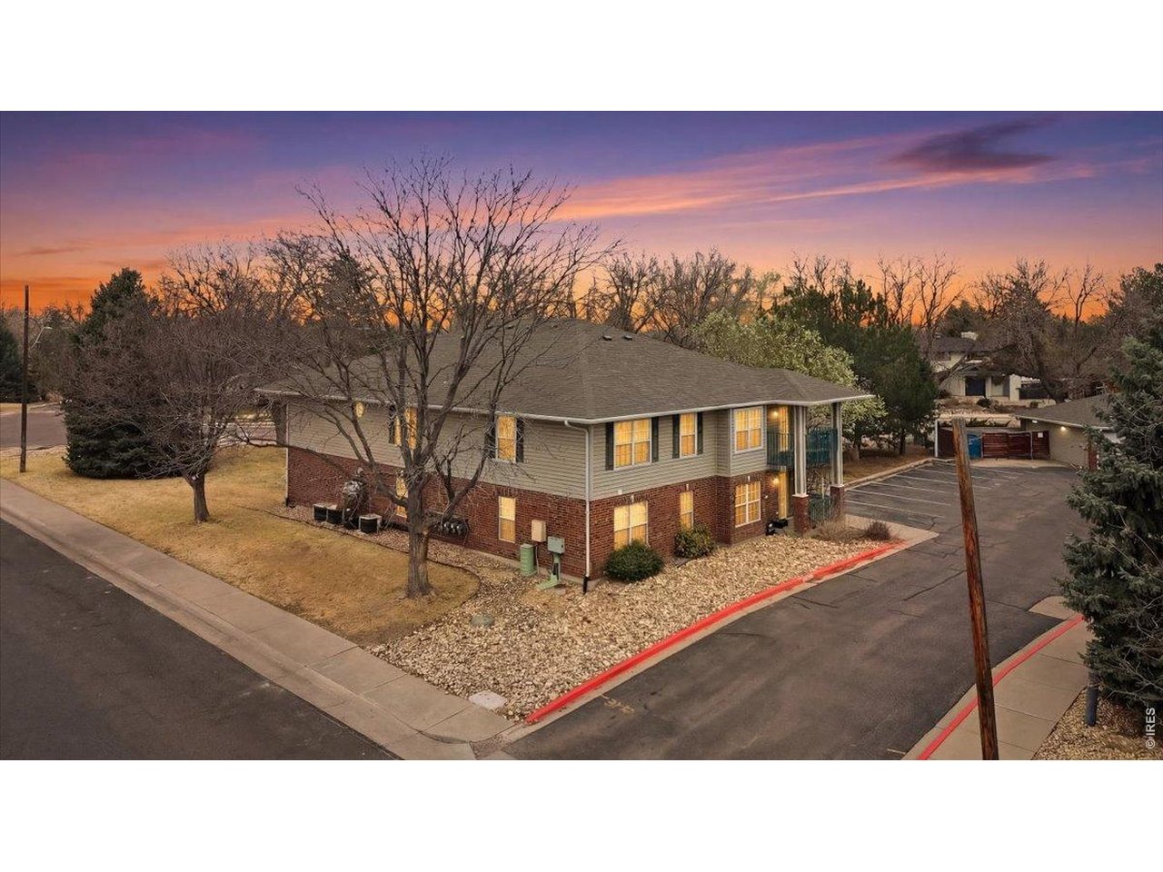 2551 West 24th Street, Unit A6 Greeley, CO 80634 - Photo 1 of 28 a view of a terrace with a yard