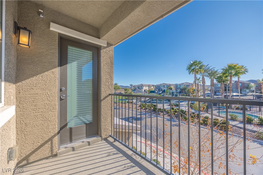 12185 Scarlet Ember Road, Unit 4 Las Vegas, NV 89183 - Photo 23 of 40 Balcony featuring a residential view