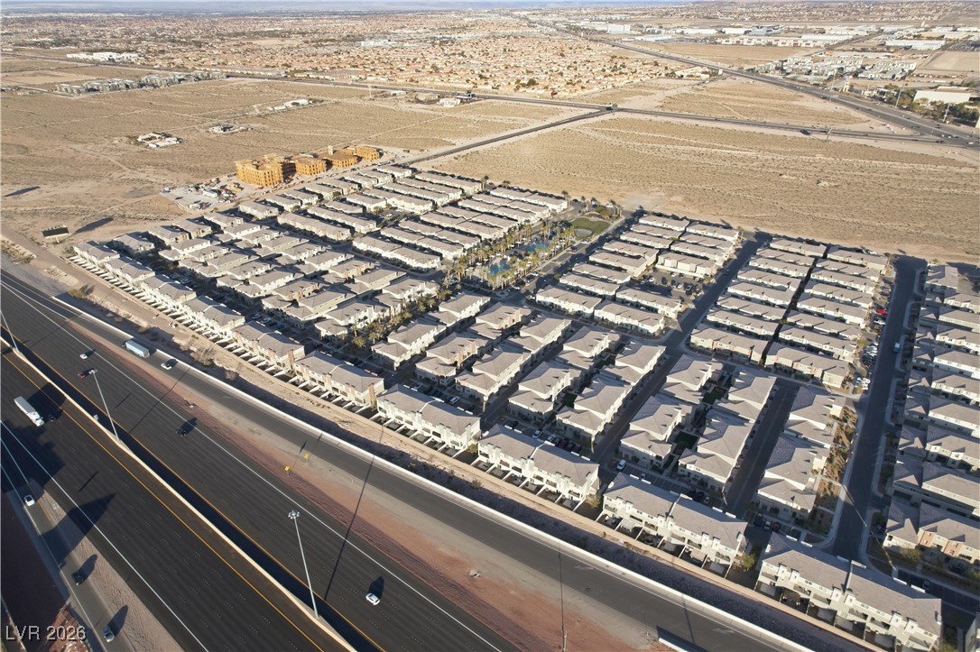 12185 Scarlet Ember Road, Unit 4 Las Vegas, NV 89183 - Photo 36 of 40 Aerial perspective of suburban area