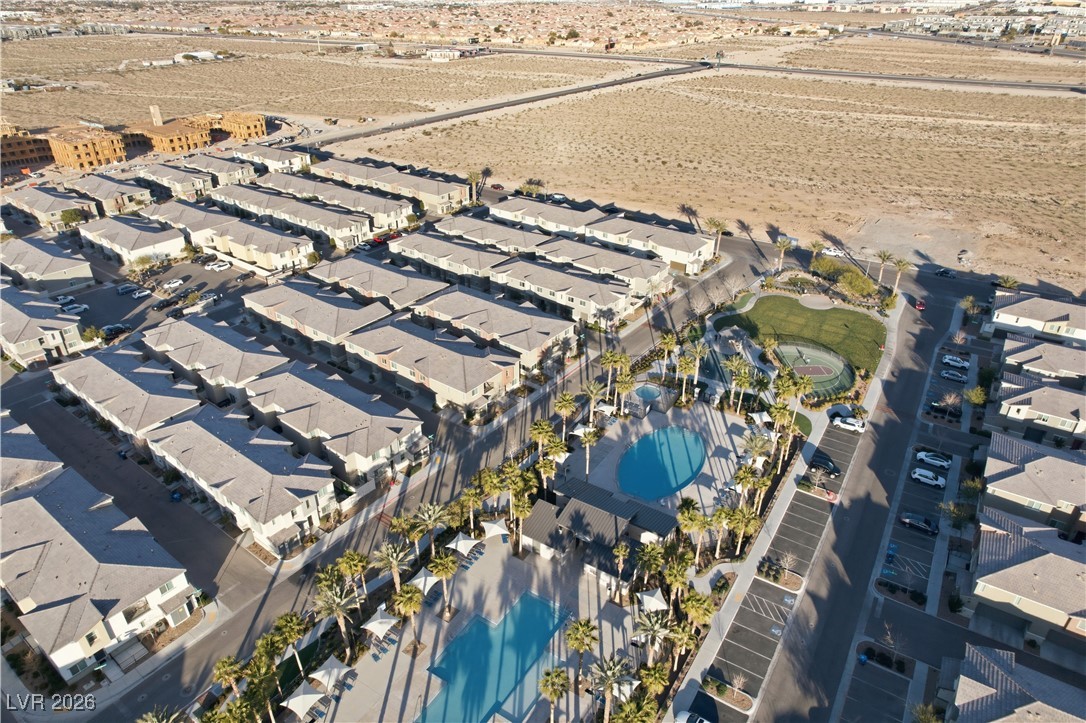 12185 Scarlet Ember Road, Unit 4 Las Vegas, NV 89183 - Photo 38 of 40 Aerial overview of property's location with nearby suburban area and a pool