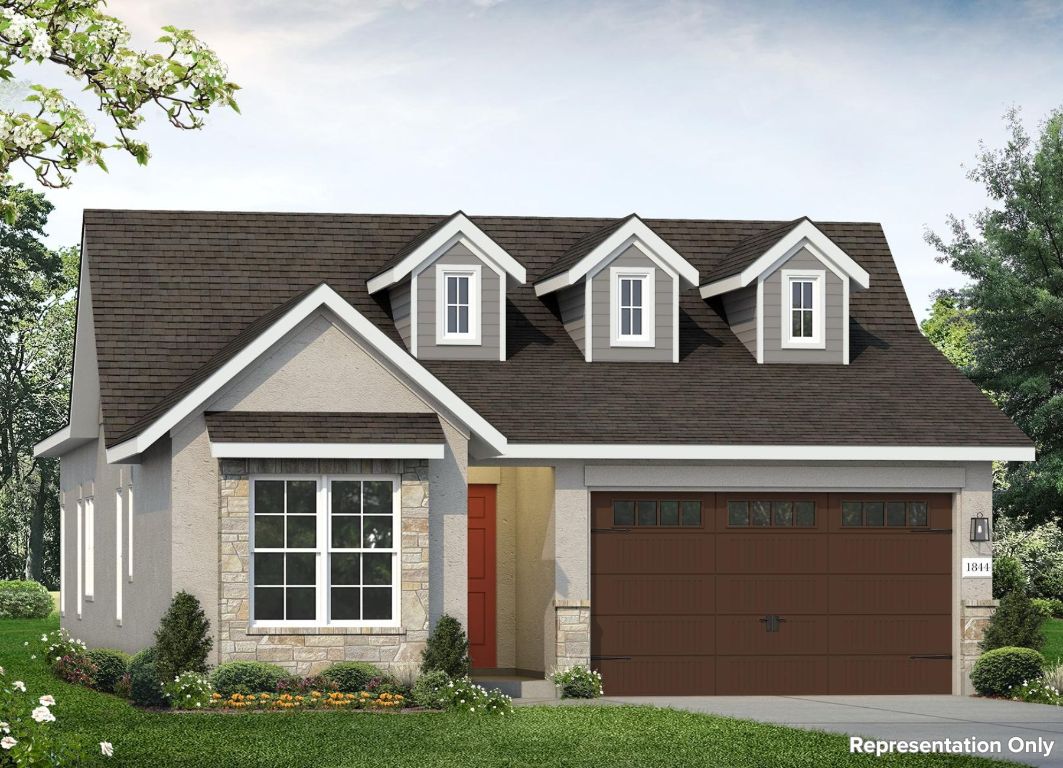 600 C-Bar Ranch Trail, Unit 122 Cedar Park, TX 78613 - Photo 3 of 31 a front view of a house with a yard and garage
