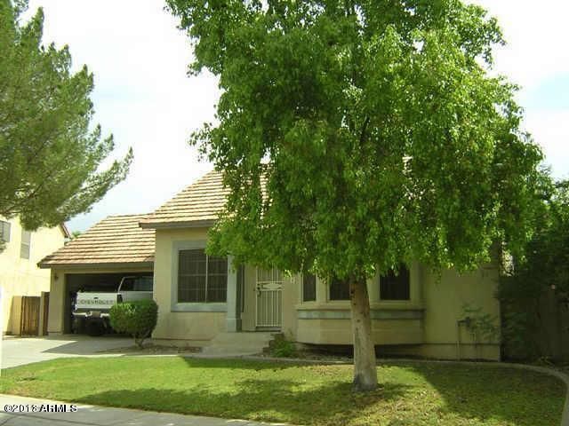 15807 South 43rd Street Phoenix, AZ 85048 - Photo 1 of 3 a view of a house with a yard porch and sitting area