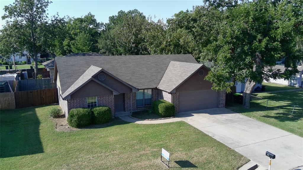 515 East Liberty Street Pilot Point, TX 76258 - Photo 25 of 25 a house view with a garden space