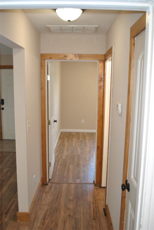 515 East Liberty Street Pilot Point, TX 76258 - Photo 7 of 25 wooden floor in a gallery