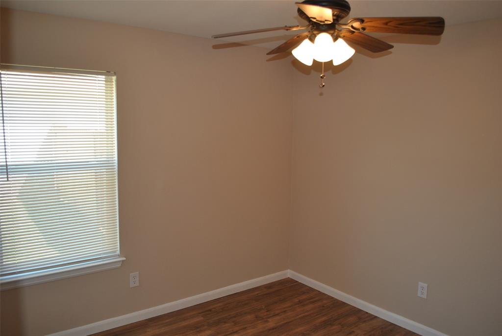 515 East Liberty Street Pilot Point, TX 76258 - Photo 8 of 25 a view of a room that has a window