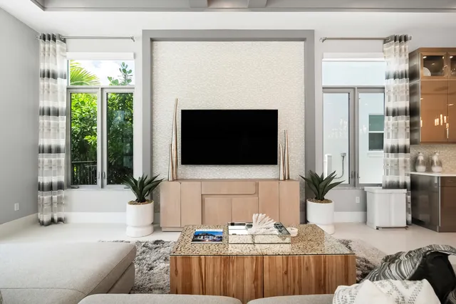 a white bath tub sitting next to a white sink