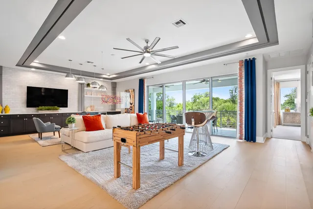 a front view of a house with garden and porch