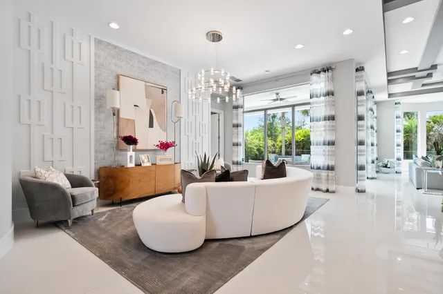 a kitchen with stainless steel appliances kitchen island granite countertop a sink and cabinets