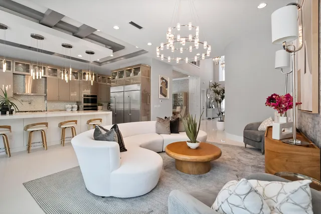 a large white kitchen with lots of counter space