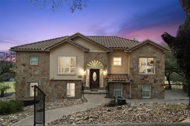 a front view of a house with a porch