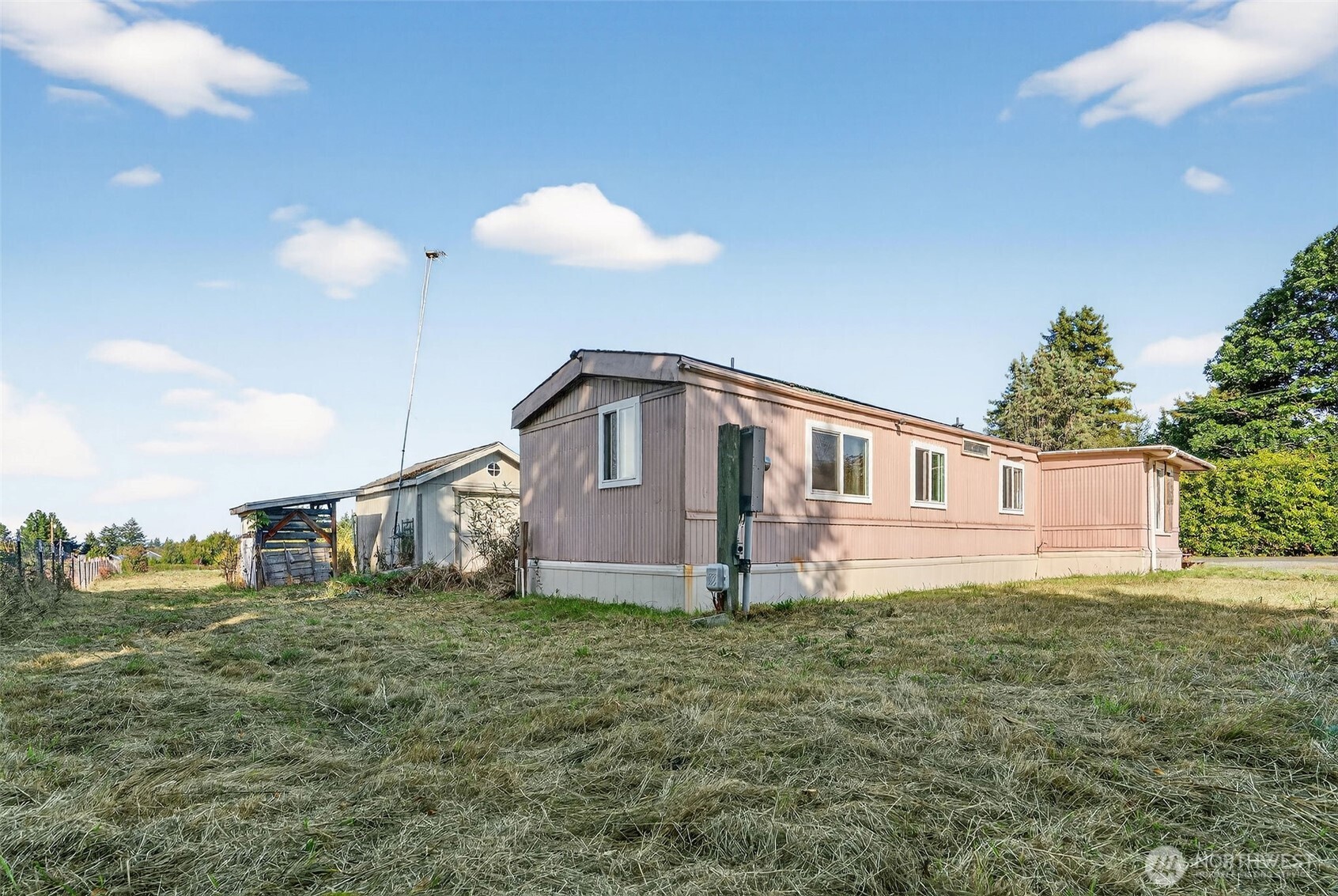 24525 59th Avenue Southwest Vashon, WA 98070 - Photo 21 of 26 a house view with a garden space
