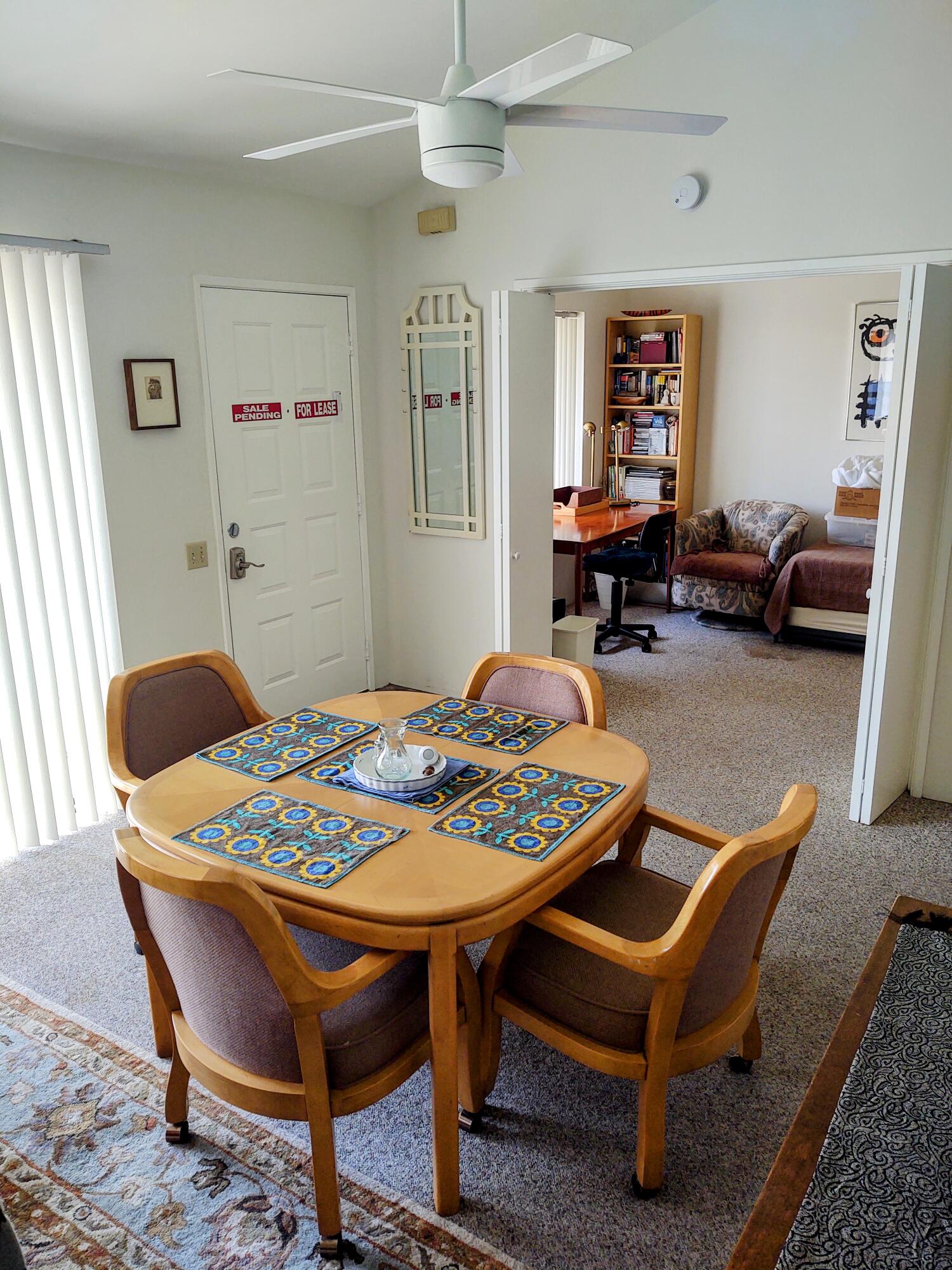 1100 East Amado Road, Unit 13B2 Palm Springs, CA 92262 - Photo 13 of 20 a view of a dining room with furniture