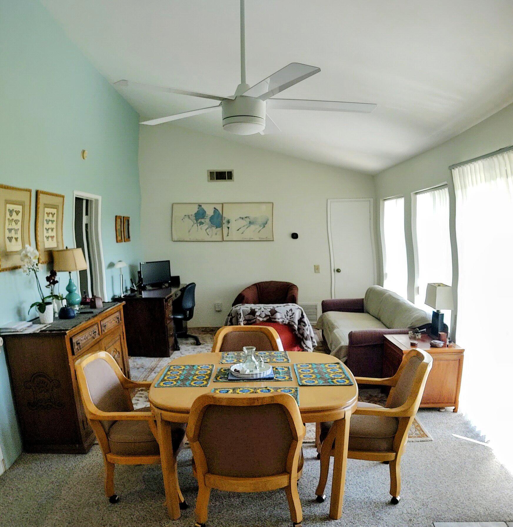 1100 East Amado Road, Unit 13B2 Palm Springs, CA 92262 - Photo 7 of 20 a view of a dining room with furniture window and outside view