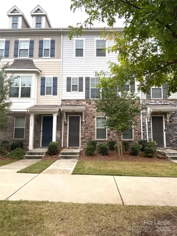 a view of a hallway with stairs