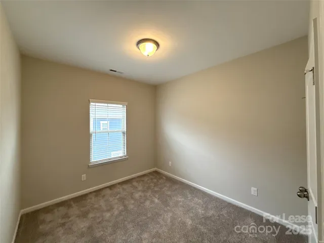 a view of a balcony with wooden floor and city view