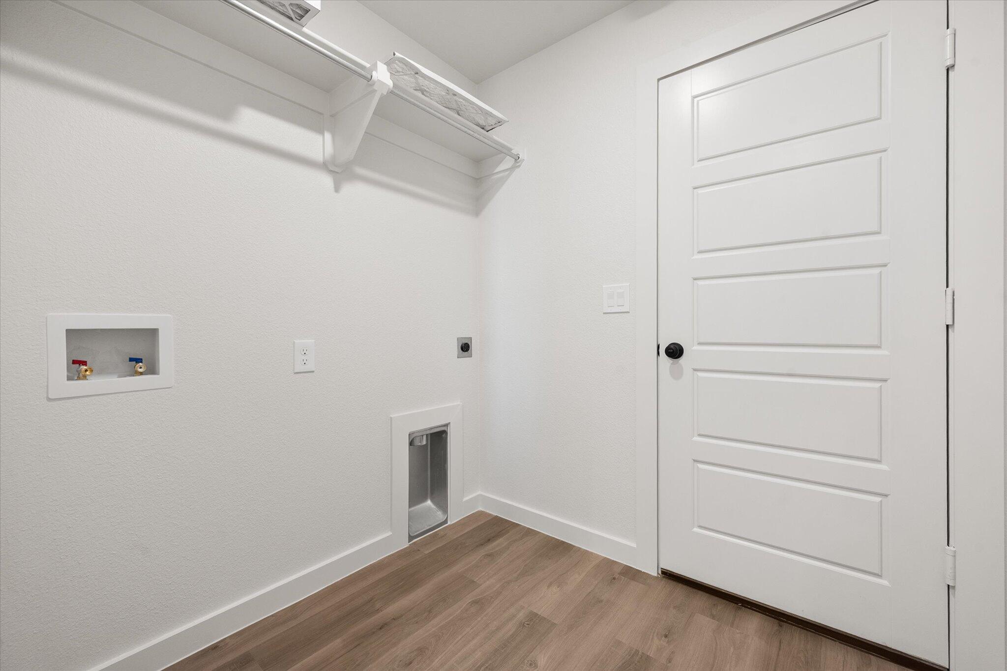 3102 138th Place Lubbock, TX 79423 - Photo 15 of 21 a view of an empty walk in closet