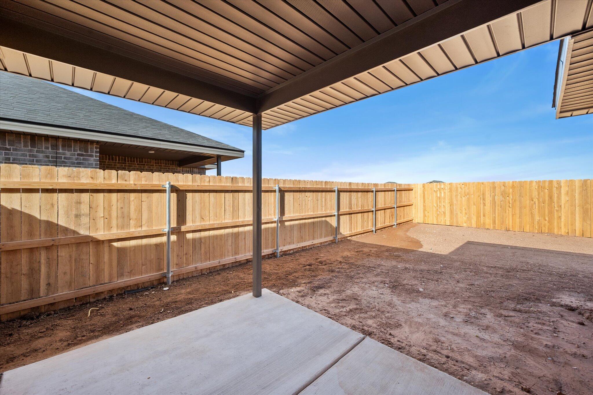 3102 138th Place Lubbock, TX 79423 - Photo 19 of 21 a view of backyard and garage