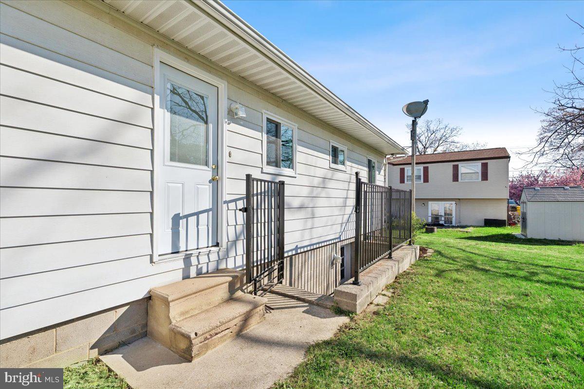723 207th Street Pasadena, MD 21122 - Photo 41 of 42 a house view with a backyard space