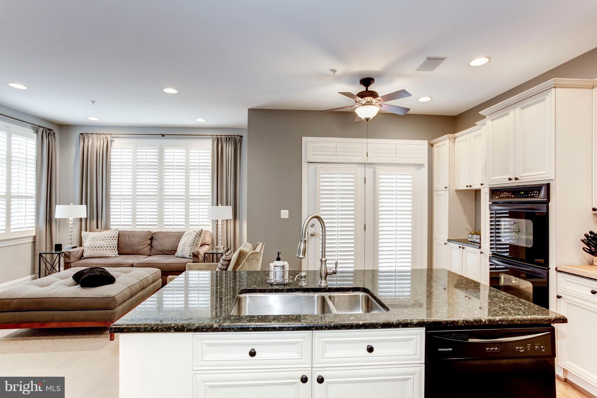 12090 Kinsley Place Reston, VA 20190 - Photo 17 of 30 Kitchen with Granite Counter Tops