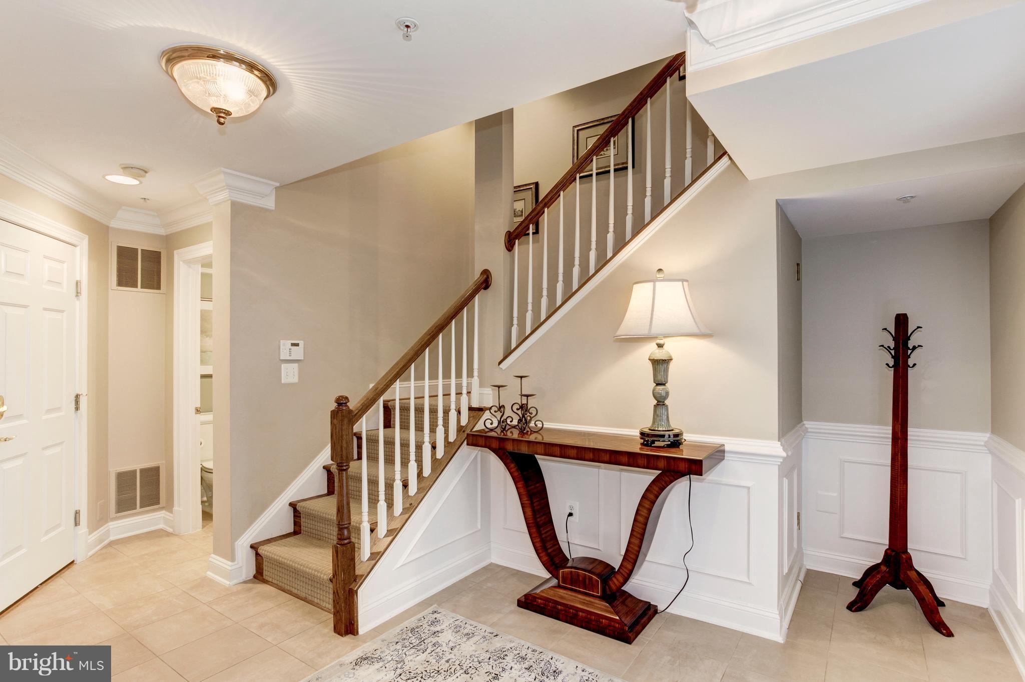 12090 Kinsley Place Reston, VA 20190 - Photo 3 of 30 Ceramic Tile Foyer