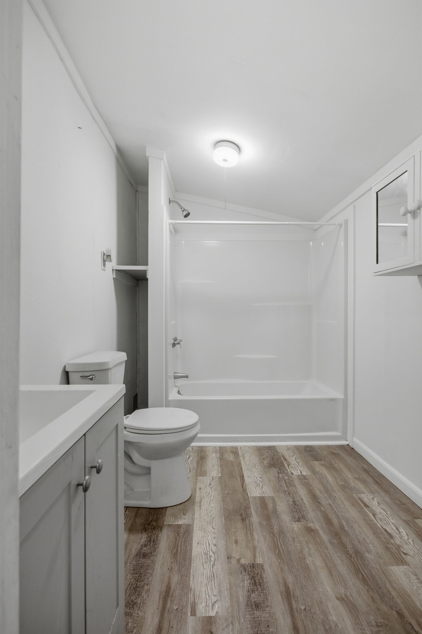 433 Jones Street Pulaski, TN 38478 - Photo 22 of 25 a bathroom with a sink toilet and shower