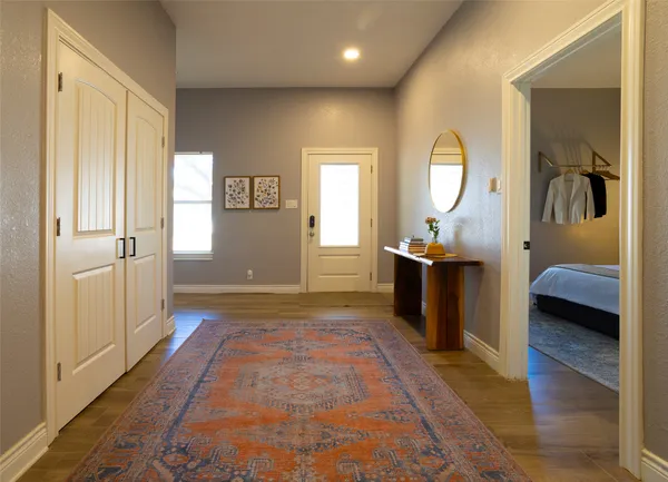 a view of a bedroom from a corridor