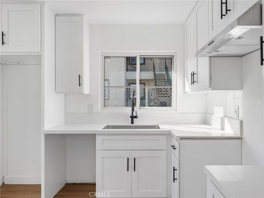 840 East Virginia Way Barstow, CA 92311 - Photo 18 of 35 a sink with white cabinets