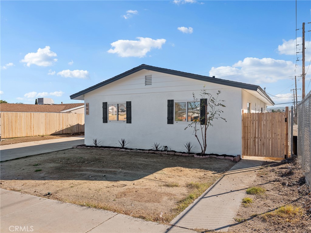 840 East Virginia Way Barstow, CA 92311 - Photo 2 of 35 a view of a house with backyard