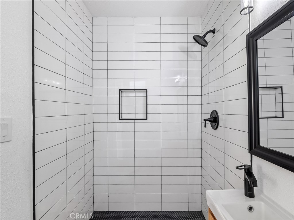 840 East Virginia Way Barstow, CA 92311 - Photo 28 of 35 a bathroom with a shower