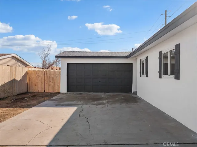 a view of a house with a garage