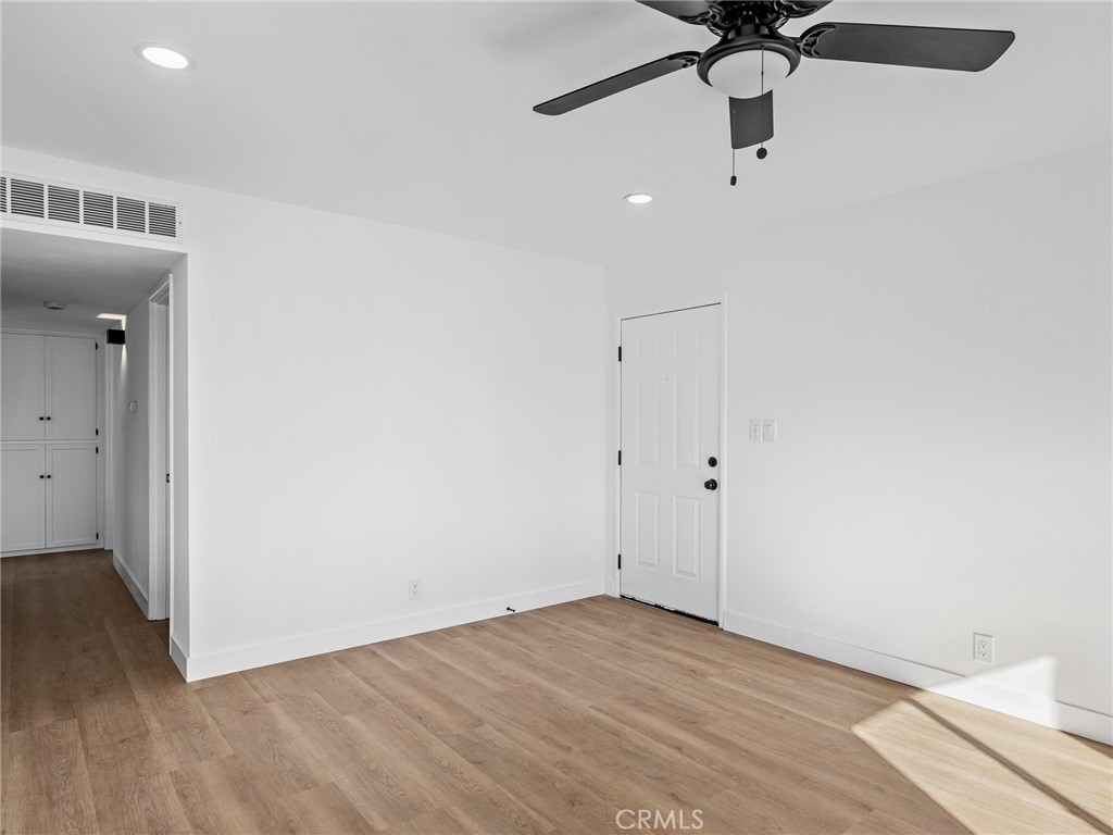 840 East Virginia Way Barstow, CA 92311 - Photo 8 of 35 a view of a room with a sink and wooden floor