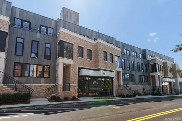 a view of a building with a street