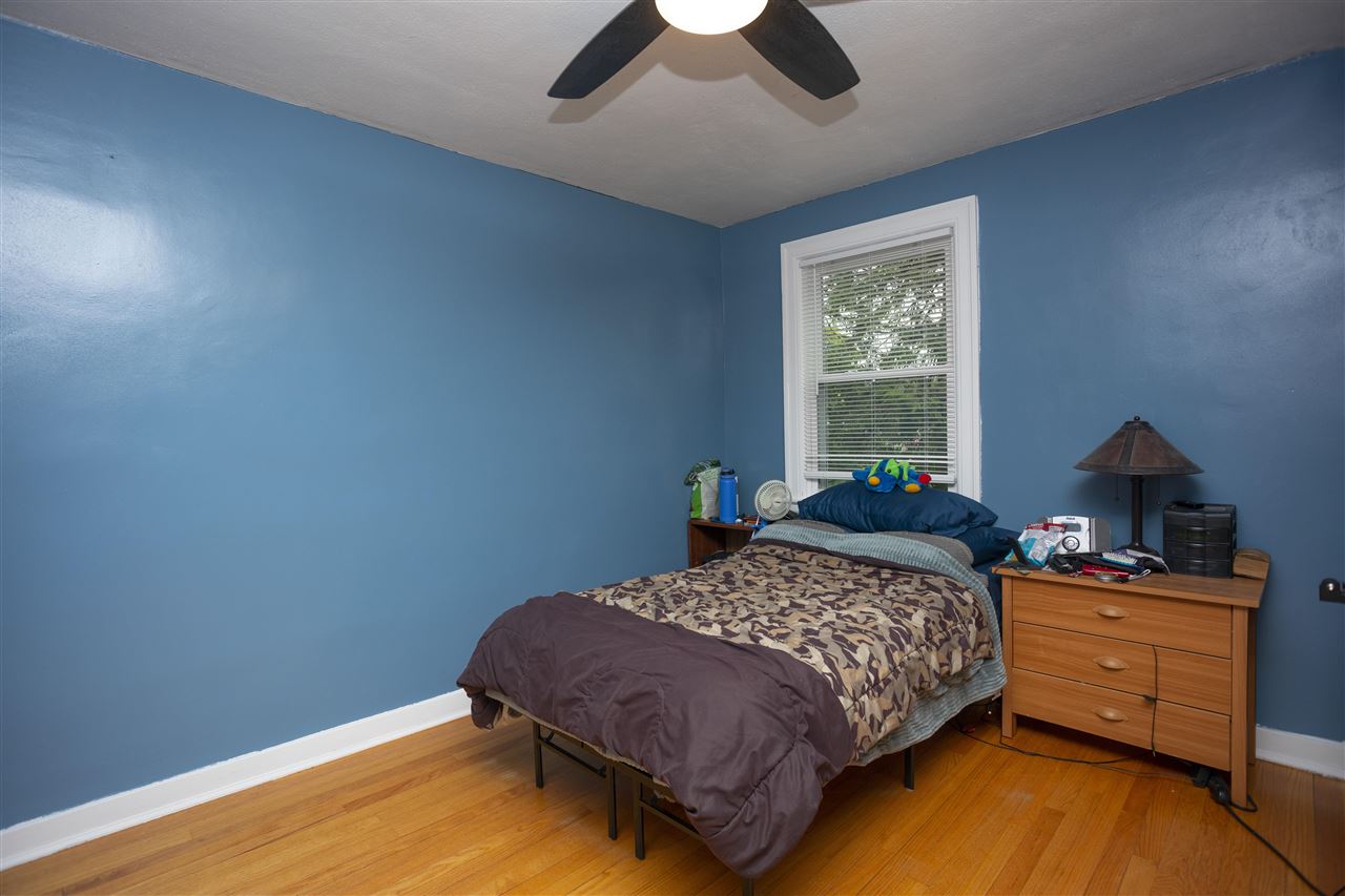 2128 North Alpine Road Rockford, IL 61107 - Photo 5 of 16 a bedroom with a bed and window