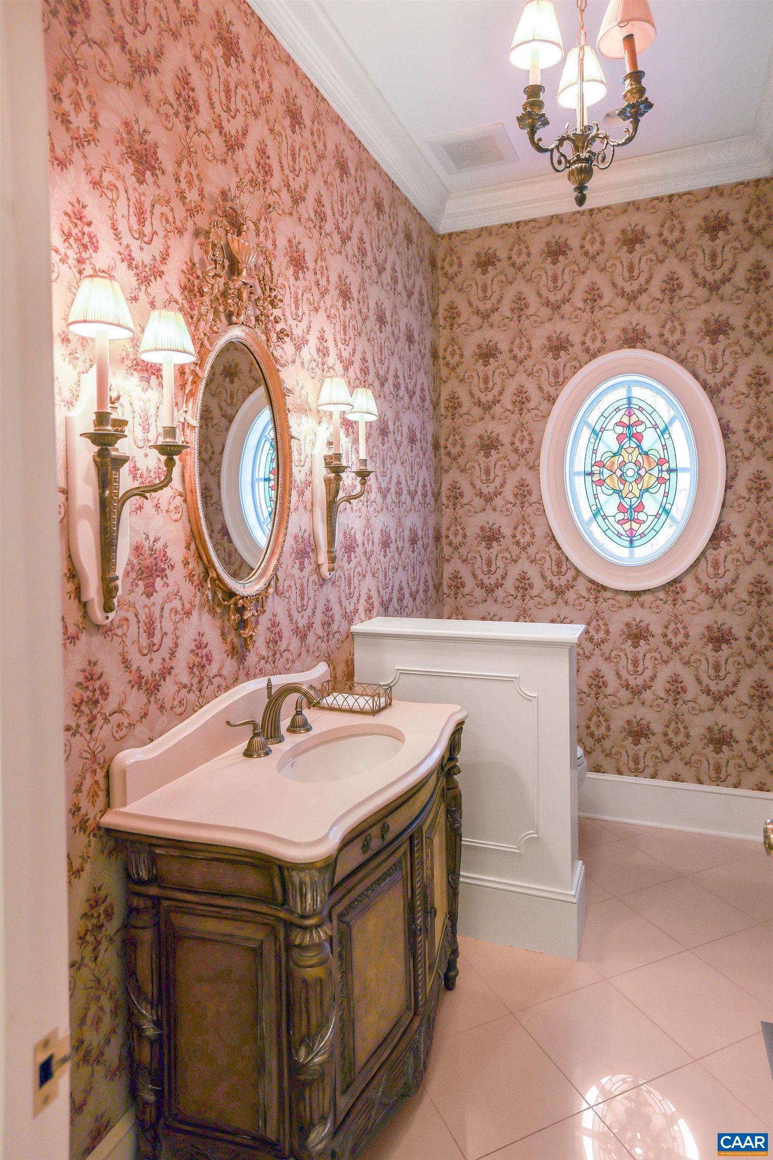 6385 Indian Ridge Drive Earlysville, VA 22936 - Photo 11 of 48 a bathroom with a sink and a mirror