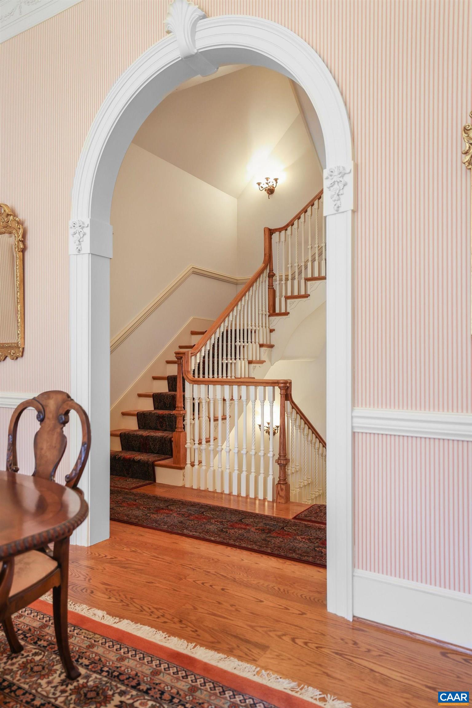 6385 Indian Ridge Drive Earlysville, VA 22936 - Photo 23 of 48 a view of entryway and hall with wooden floor