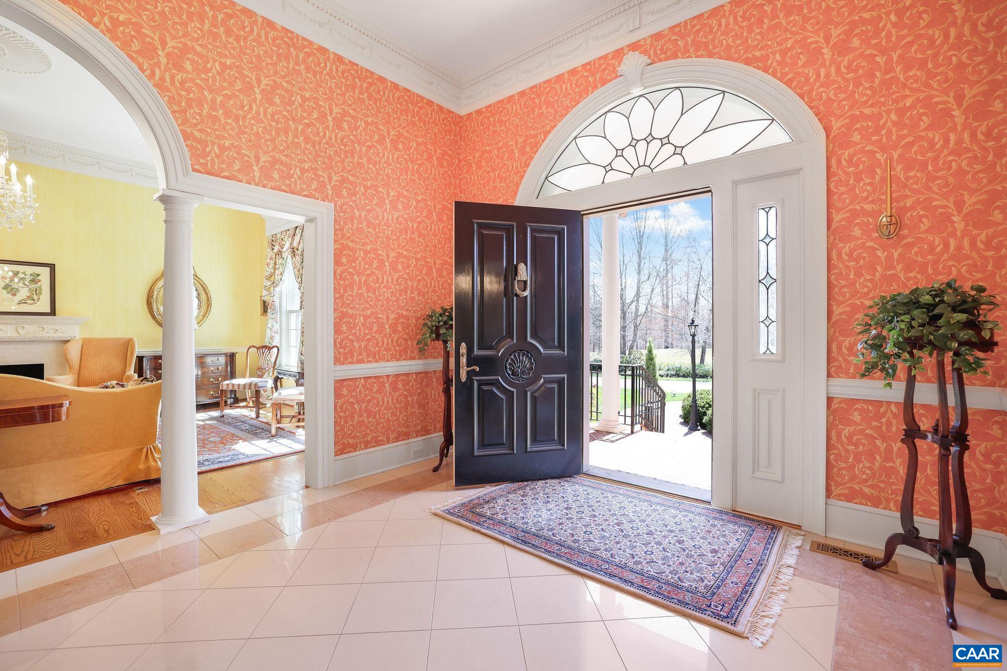 6385 Indian Ridge Drive Earlysville, VA 22936 - Photo 3 of 48 a view of an entryway with a rug