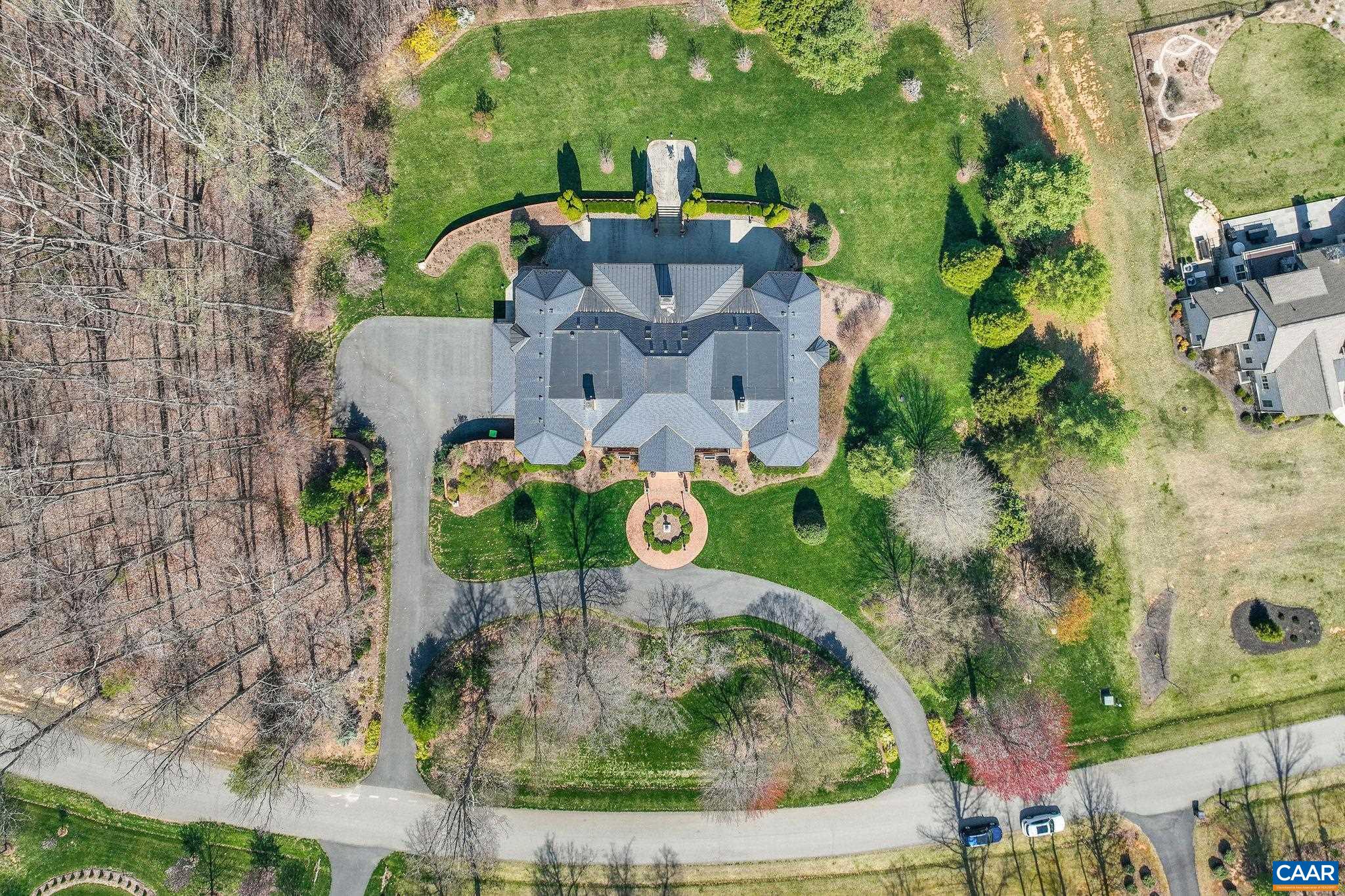 6385 Indian Ridge Drive Earlysville, VA 22936 - Photo 44 of 48 an aerial view of a house with garden space and street view