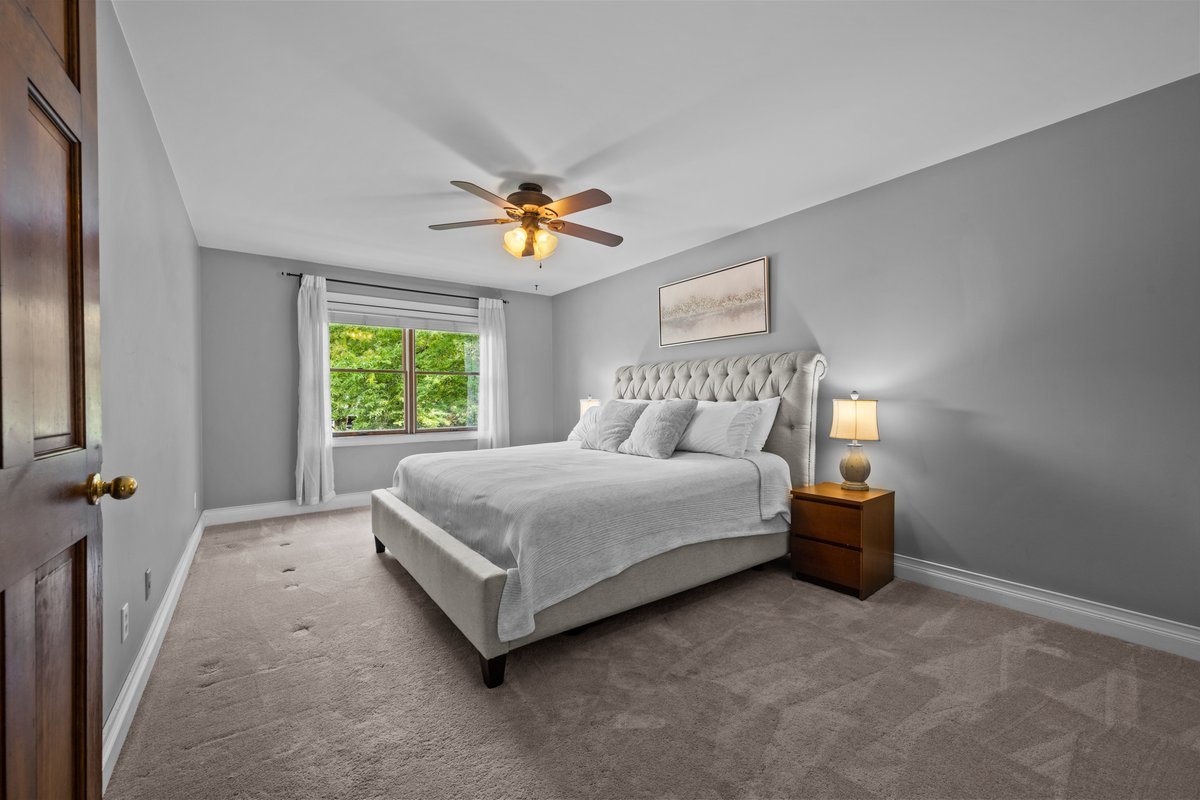 2115 Forest Ridge Road St. Charles, IL 60174 - Photo 16 of 25 a bedroom with a bed and a window