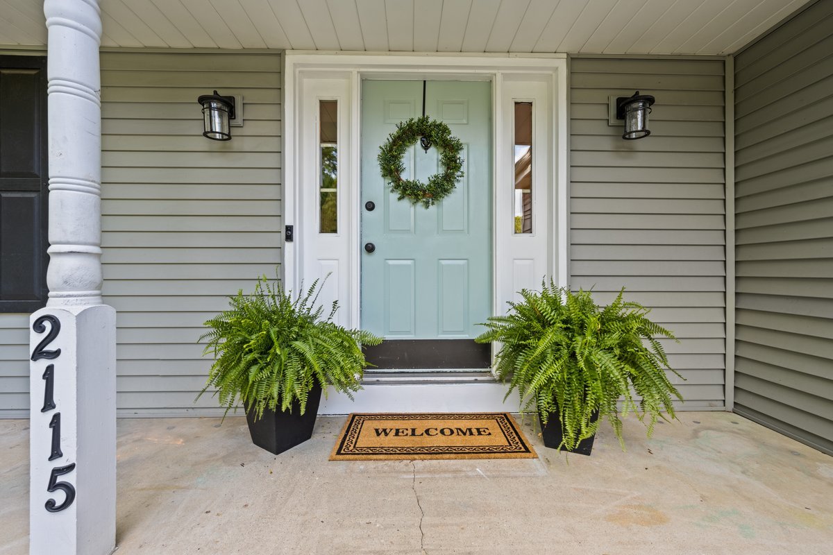 2115 Forest Ridge Road St. Charles, IL 60174 - Photo 2 of 25 a couple of potted plants in front of door
