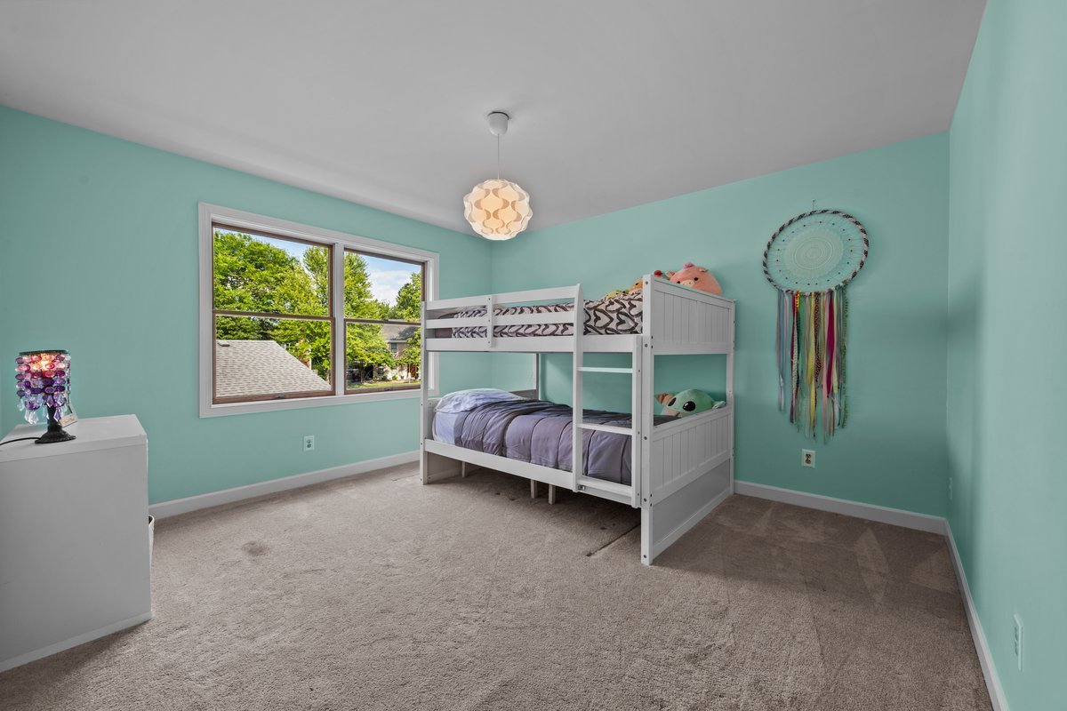 2115 Forest Ridge Road St. Charles, IL 60174 - Photo 21 of 25 a bed room with a bed and a window