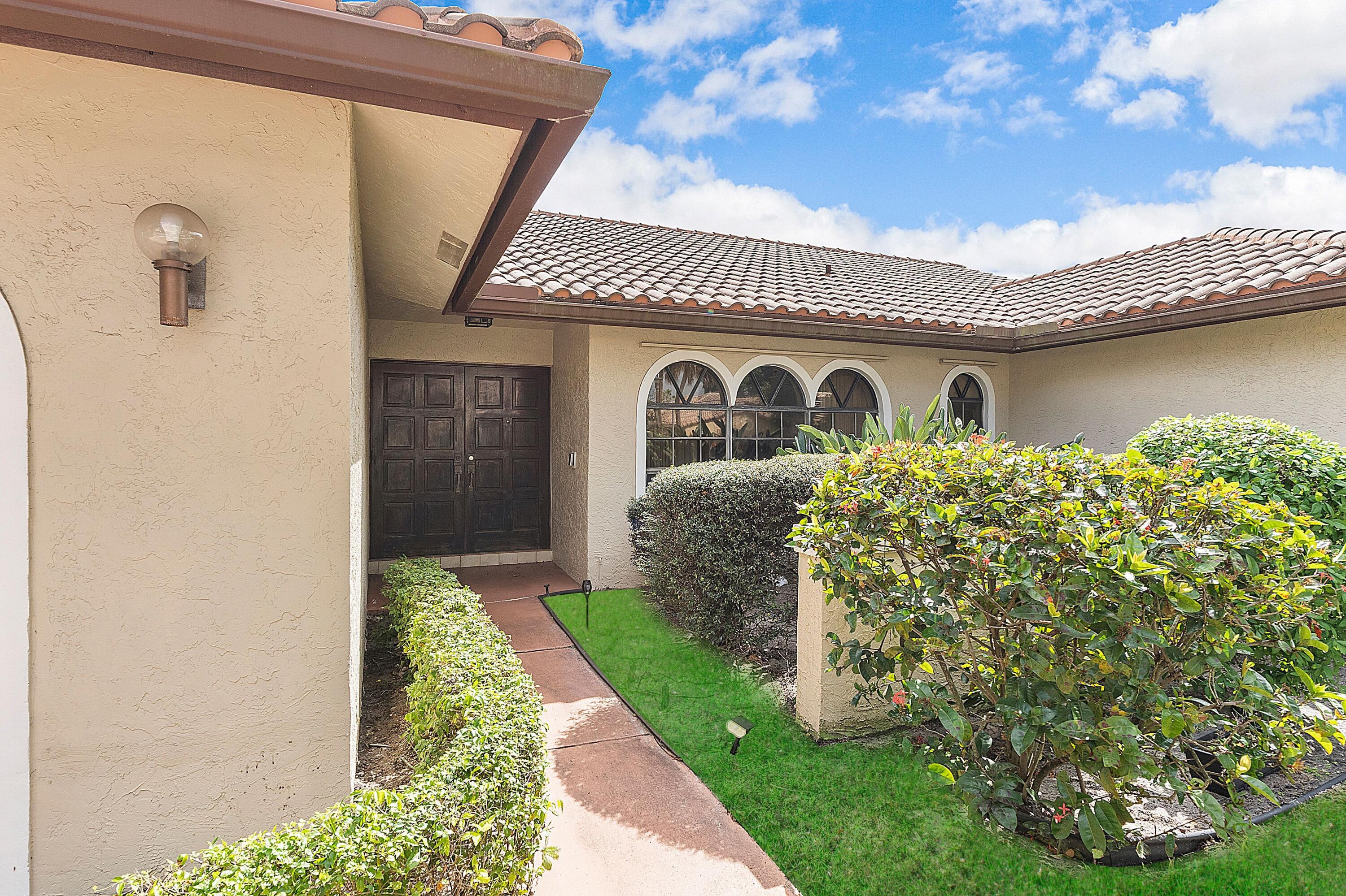2684 Northwest 27th Terrace Boca Raton, FL 33434 - Photo 38 of 42 FRONT WALK WAY