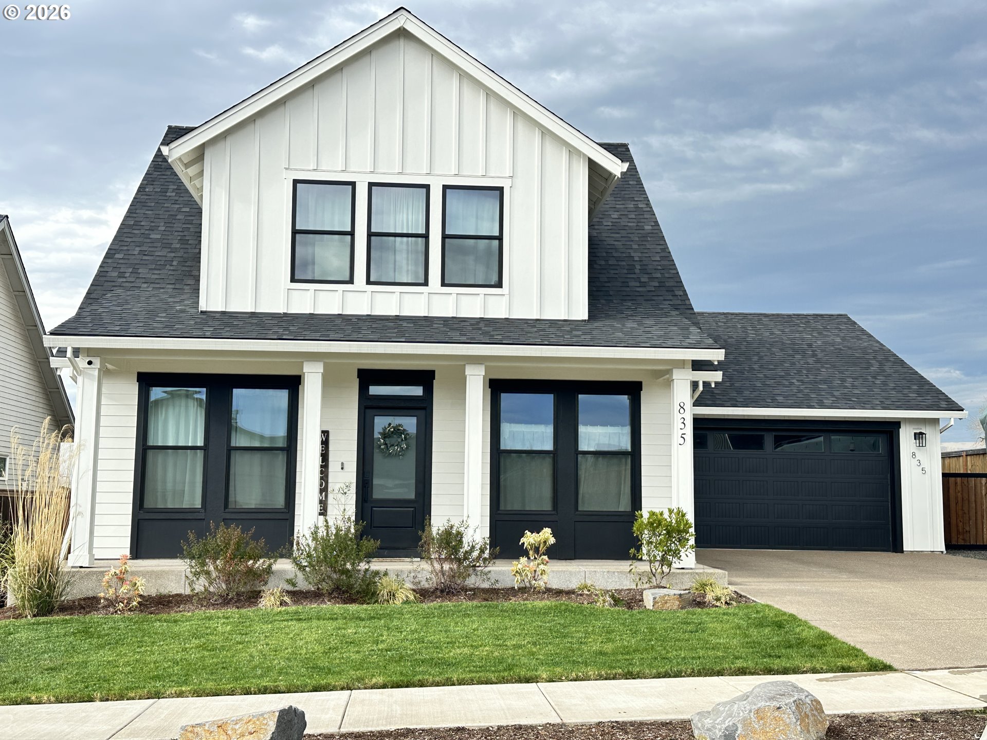 835 Reagan Street Mount Angel, OR 97362 - Photo 1 of 45 a front view of a house with garden