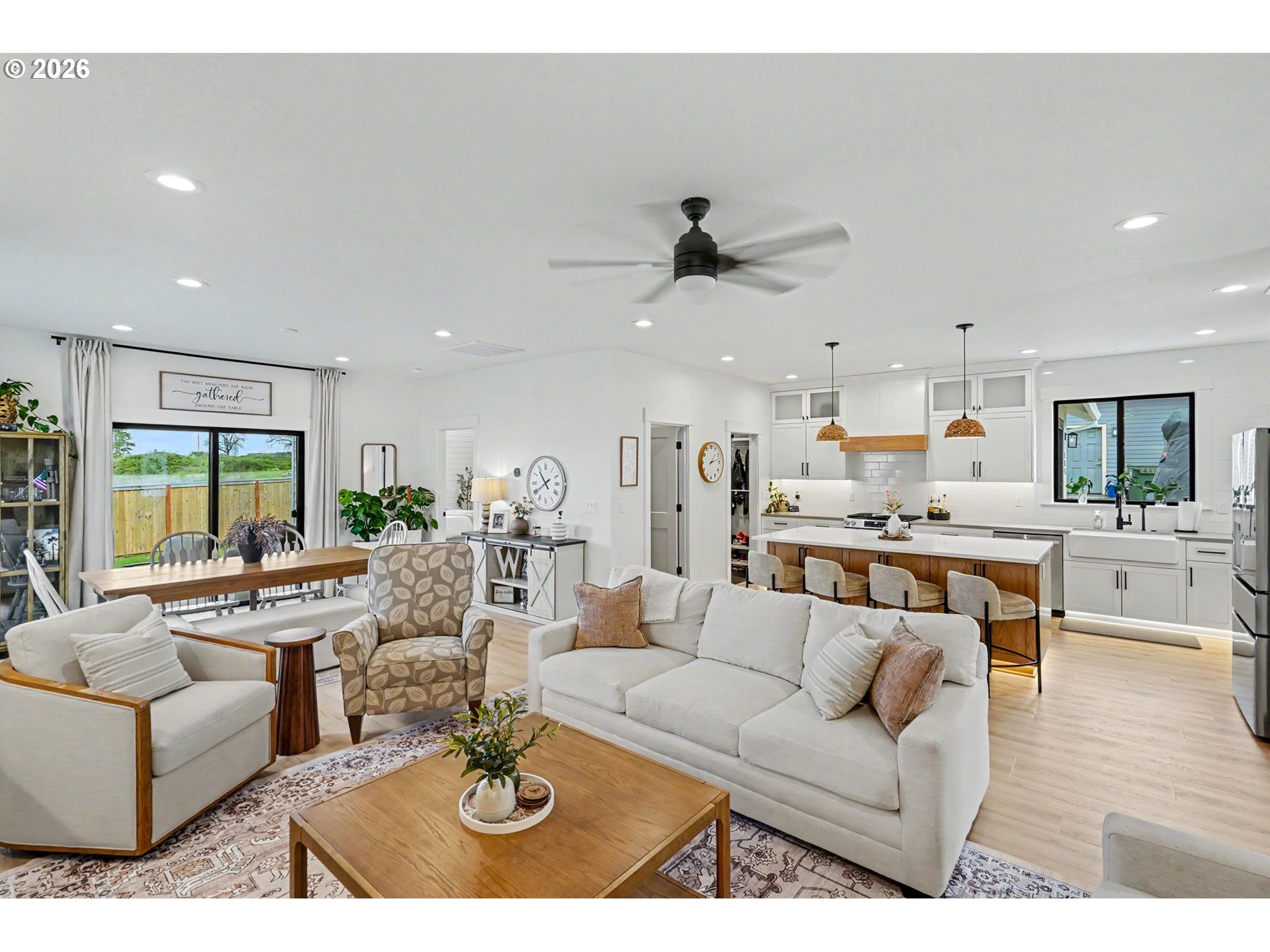 835 Reagan Street Mount Angel, OR 97362 - Photo 11 of 45 a living room with furniture kitchen view and a large window