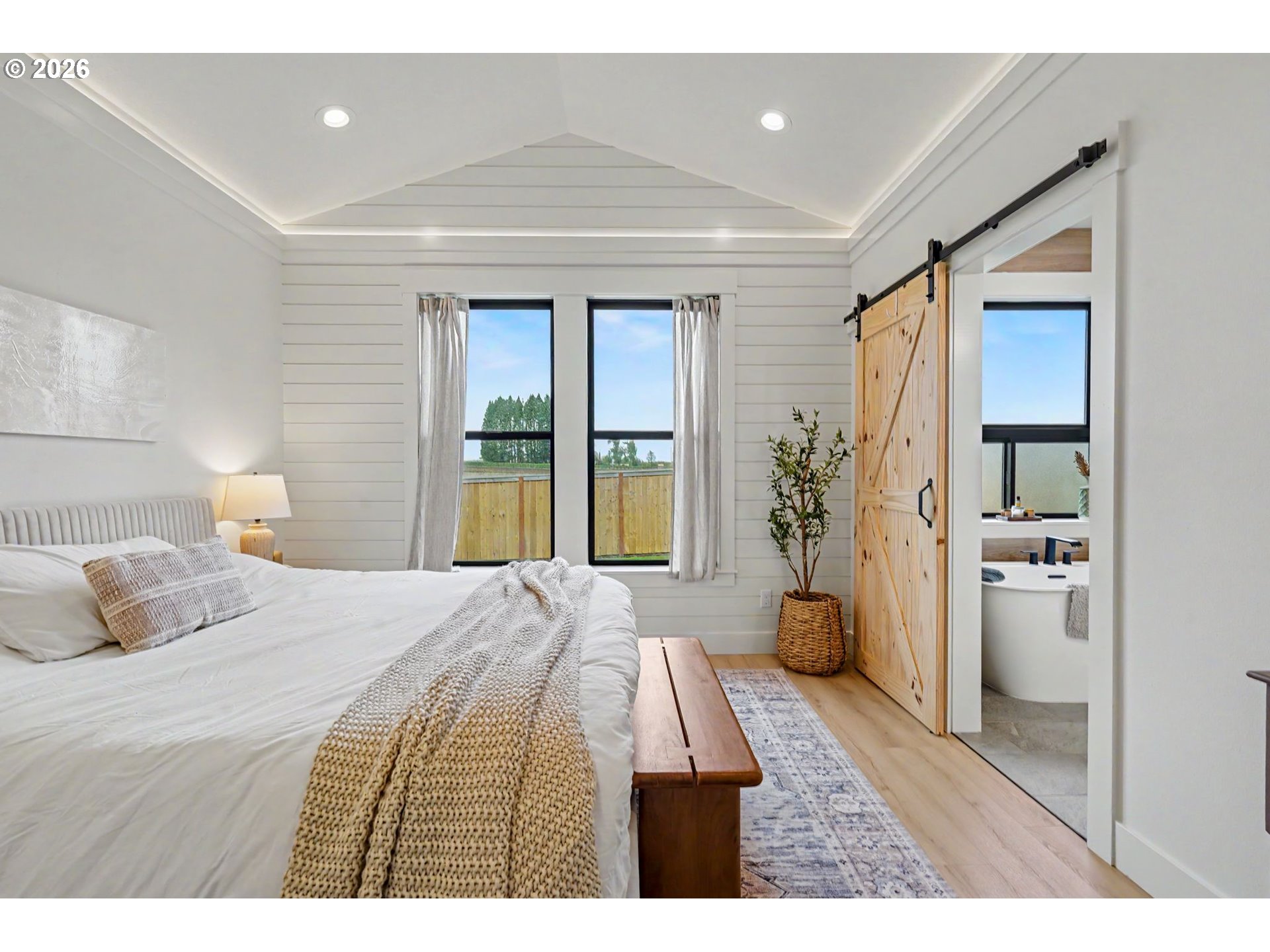 835 Reagan Street Mount Angel, OR 97362 - Photo 23 of 45 a bedroom with a bed and a large window
